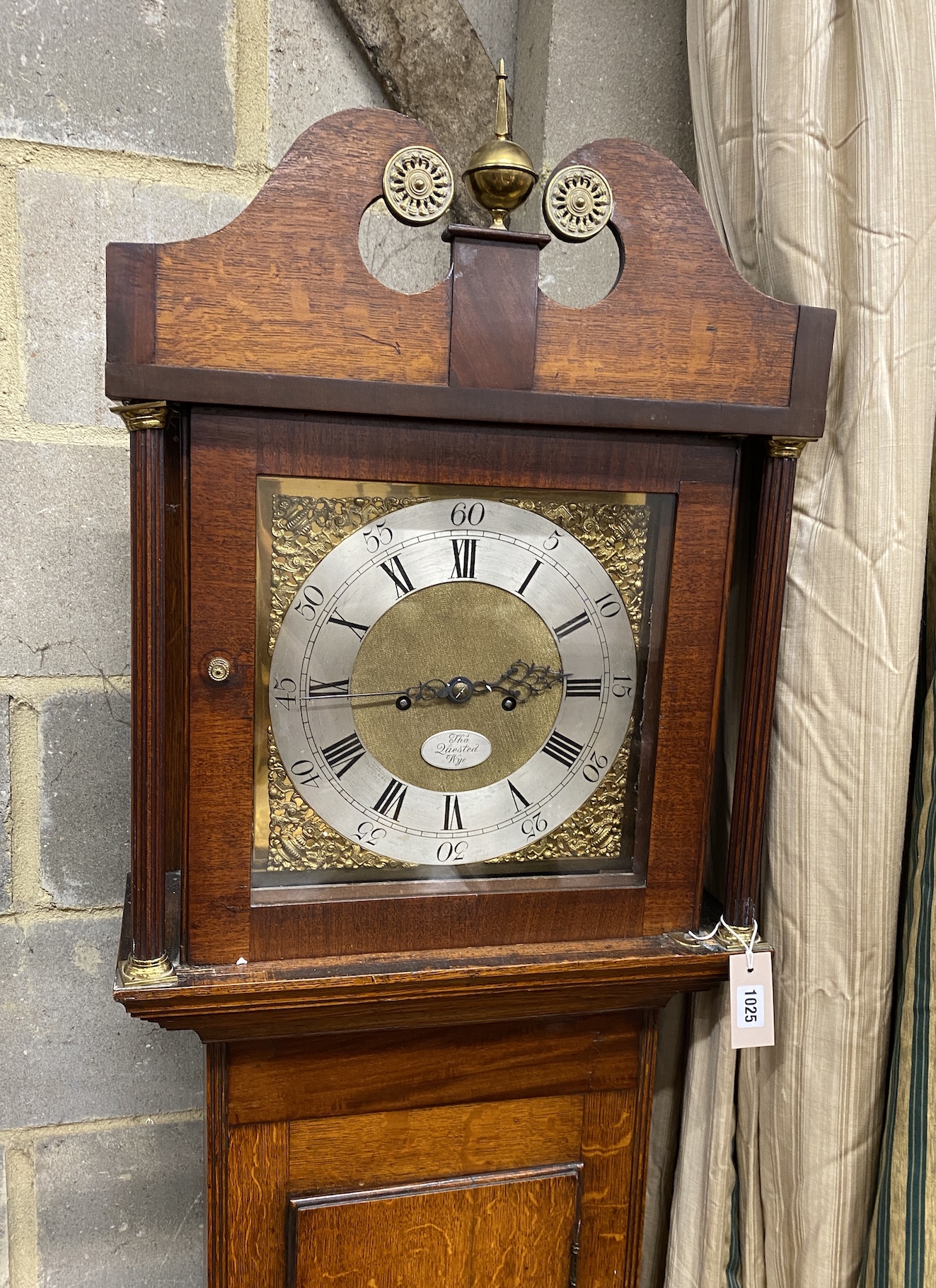 An early 19th century mahogany and banded oak eight day longcase clock marked Thomas Quested, Wye, height 206cm